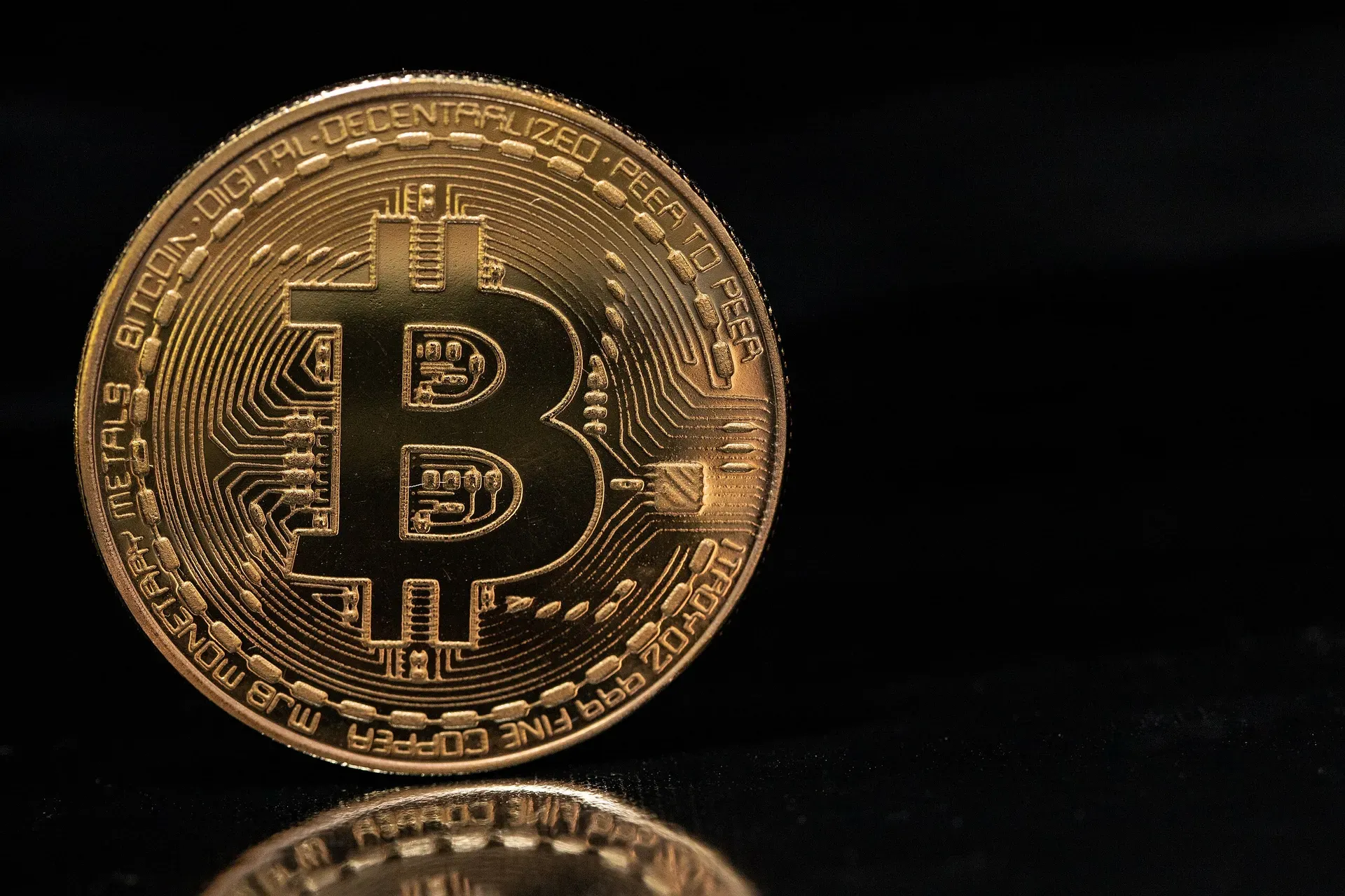 Picture of a Bitcoin against a black background