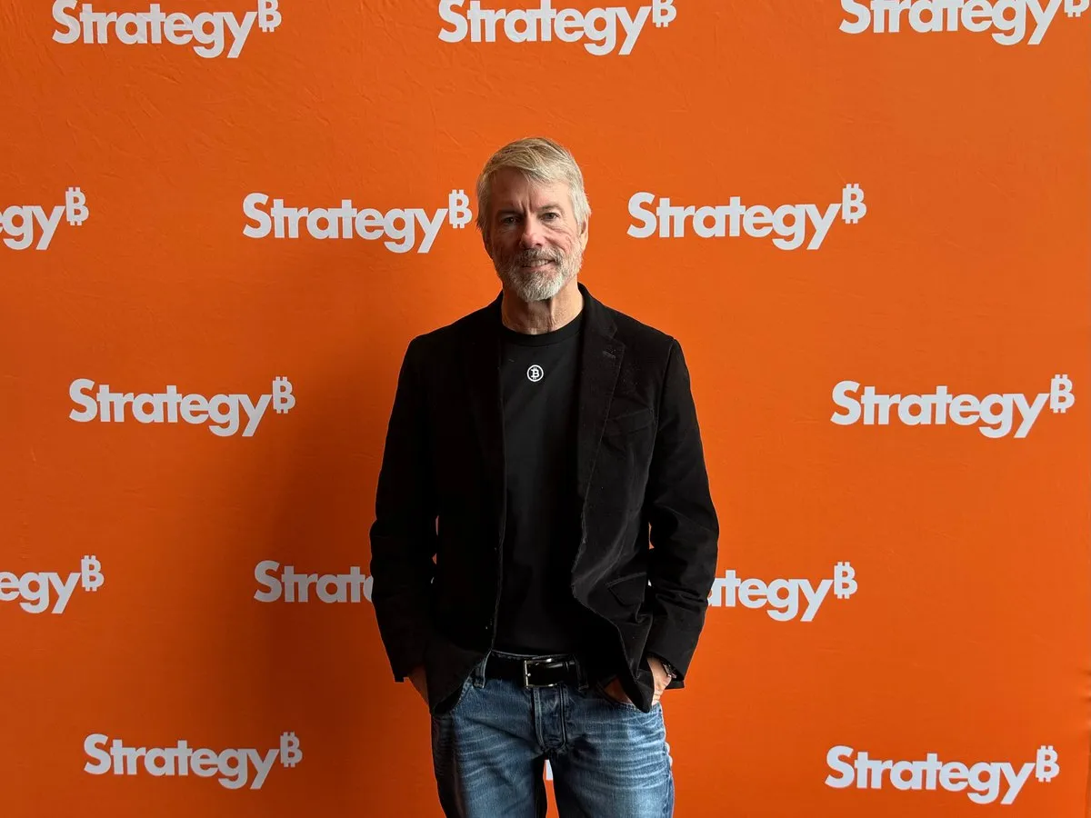 Michael Saylor with Strategy logo in the back